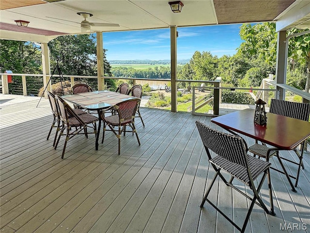 501 4th St W, Hermann, MO 65041 - wooden terrace featuring outdoor dining area and ceiling fan