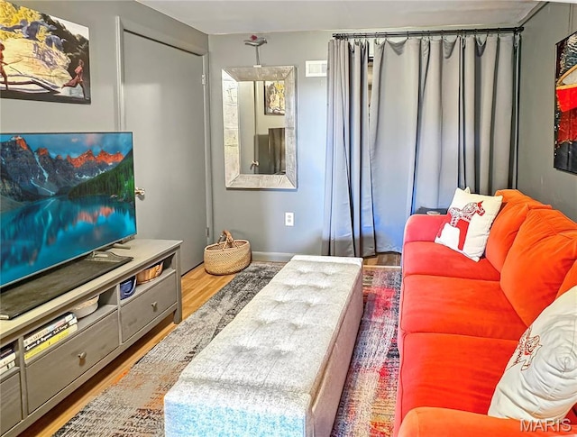 501 4th St W, Hermann, MO 65041 - living area featuring wood finished floors and baseboards
