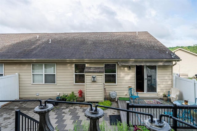 14 Club Ct, Union, MO 63084 - back of house with roof with shingles and a patio area