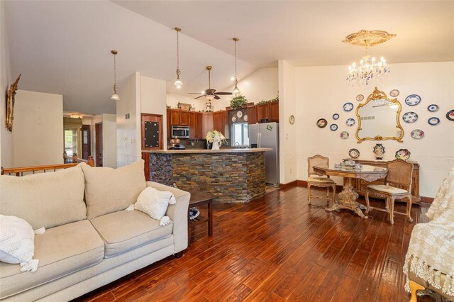 14 Club Ct, Union, MO 63084 - living room with a chandelier, dark wood finished floors, high vaulted ceiling, ceiling fan, and baseboards