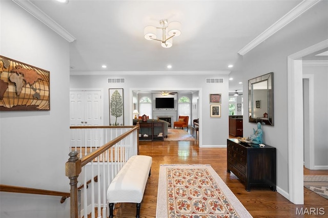 29 Spoede Ln, Creve Coeur, MO 63141 - hall with wood finished floors, crown molding, and recessed lighting