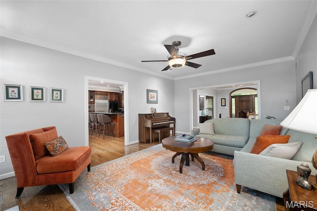 29 Spoede Ln, Creve Coeur, MO 63141 - living area featuring wood finished floors, ceiling fan, and crown molding