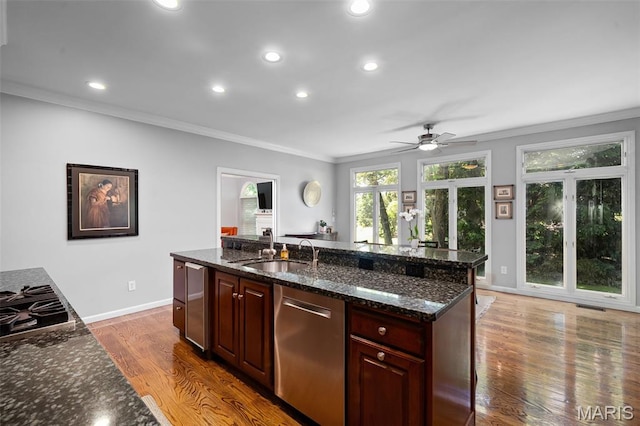 29 Spoede Ln, Creve Coeur, MO 63141 - kitchen with appliances with stainless steel finishes, crown molding, recessed lighting, wood finished floors, and ceiling fan