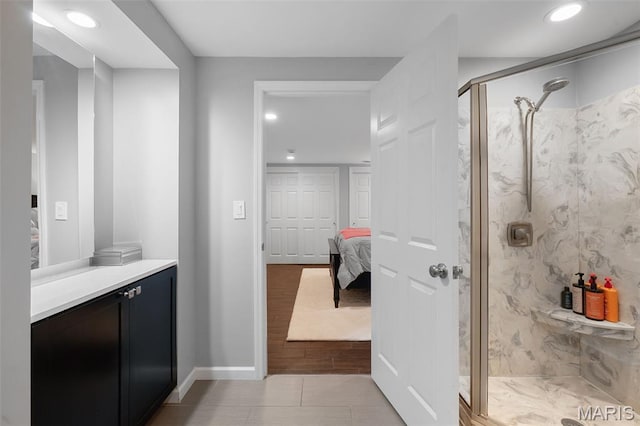 29 Spoede Ln, Creve Coeur, MO 63141 - full bathroom featuring a marble finish shower, ensuite bathroom, vanity, recessed lighting, and tile patterned floors