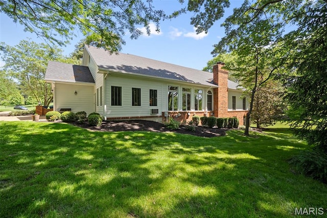 29 Spoede Ln, Creve Coeur, MO 63141 - back of house with a yard and a chimney