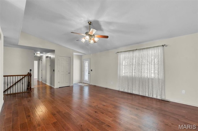 732 Woodridge Ln, Perryville, MO 63775 - unfurnished living room with a ceiling fan, hardwood / wood-style floors, vaulted ceiling, and baseboards