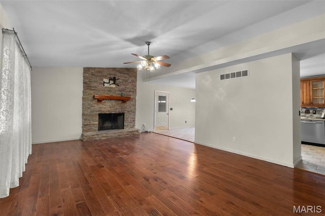 732 Woodridge Ln, Perryville, MO 63775 - unfurnished living room with a ceiling fan, wood finished floors, baseboards, and vaulted ceiling