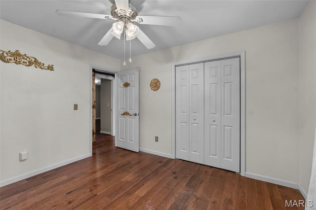 732 Woodridge Ln, Perryville, MO 63775 - unfurnished bedroom with dark wood-style flooring, baseboards, a closet, and ceiling fan