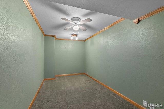 732 Woodridge Ln, Perryville, MO 63775 - carpeted spare room with crown molding, a textured wall, baseboards, and ceiling fan