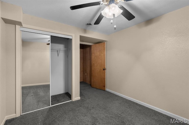 732 Woodridge Ln, Perryville, MO 63775 - unfurnished bedroom featuring carpet flooring, a closet, a ceiling fan, and baseboards