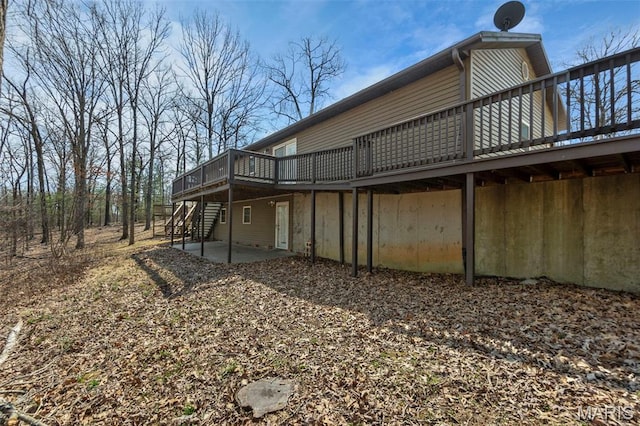 732 Woodridge Ln, Perryville, MO 63775 - rear view of property with a deck, stairs, and a patio area