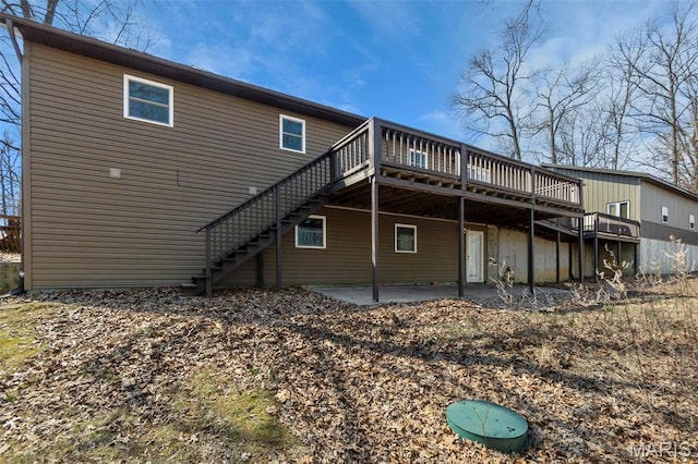 732 Woodridge Ln, Perryville, MO 63775 - rear view of property with a deck, stairs, and a patio area