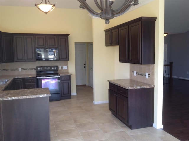 1605 Sugar Creek Dr, Festus, MO 63028 - kitchen featuring black microwave, stainless steel electric range, decorative backsplash, light tile patterned floors, and dark brown cabinetry