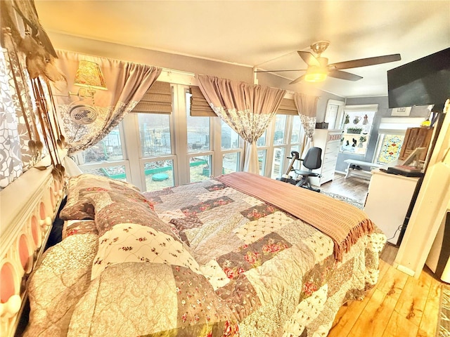 10063 Mockingbird Dr, Holiday Shores, MO 63624 - bedroom featuring wood finished floors and a ceiling fan