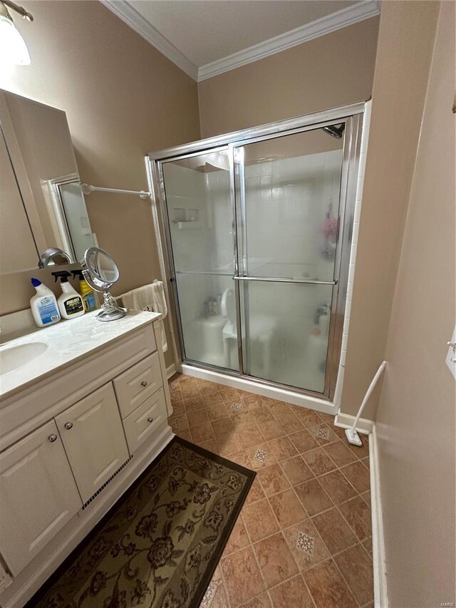 10 Cherokee Rdg, Sikeston, MO 63801 - bathroom with ornamental molding, a shower stall, and vanity