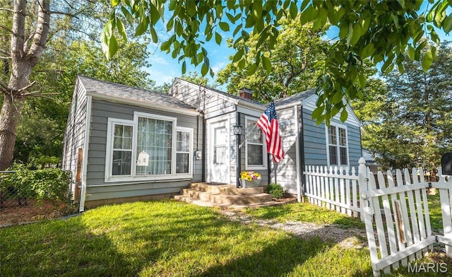 801 E 14th St, Rolla, MO 65401 - view of front of house featuring a chimney