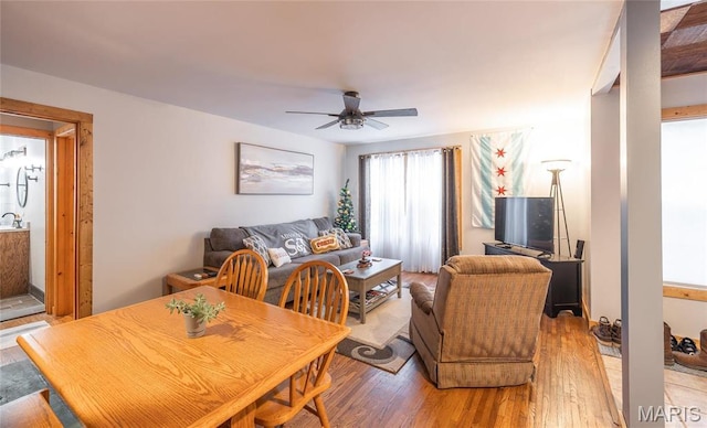 801 E 14th St, Rolla, MO 65401 - dining area featuring a ceiling fan and wood finished floors