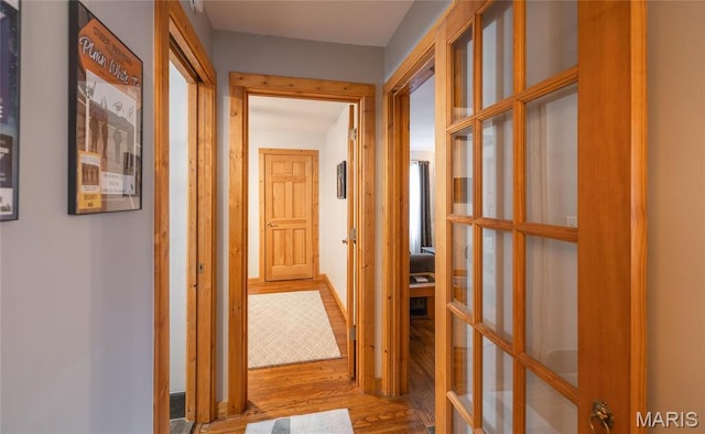 801 E 14th St, Rolla, MO 65401 - corridor with wood finished floors and french doors