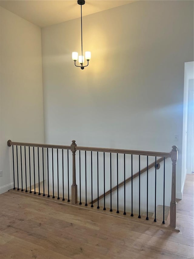 1066 Bloomfield Dr, Eureka, MO 63025 - stairway with wood finished floors and baseboards