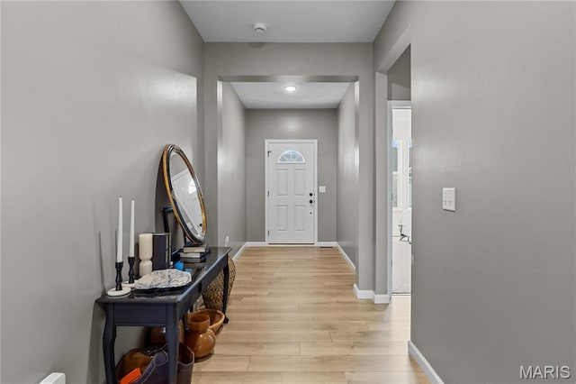 138 Rhythm Point Dr, Saint Peters, MO 63376 - doorway with light wood-style flooring and baseboards