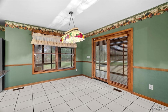 23 Falling Leaf Dr, Lake St Louis, MO 63367 - unfurnished room with baseboards and tile patterned floors