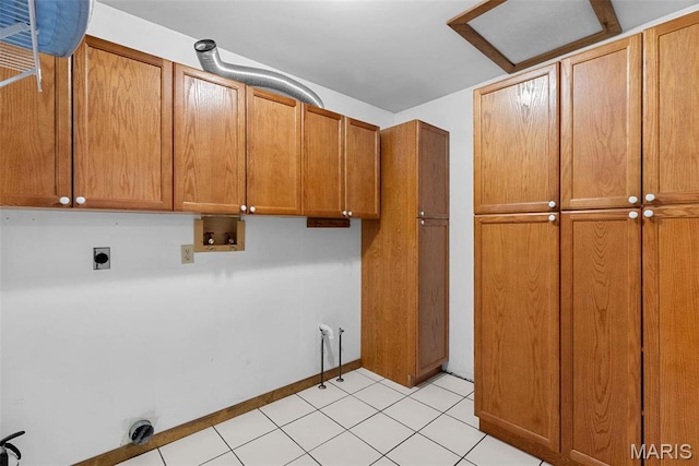 23 Falling Leaf Dr, Lake St Louis, MO 63367 - washroom featuring electric dryer hookup, cabinet space, hookup for a washing machine, baseboards, and light tile patterned flooring
