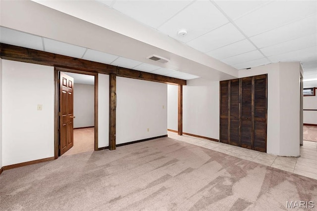 23 Falling Leaf Dr, Lake St Louis, MO 63367 - finished below grade area featuring a drop ceiling, carpet flooring, and baseboards