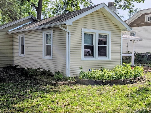 10544 Decker Ave, Saint Louis, MO 63114 - view of property exterior featuring a chimney