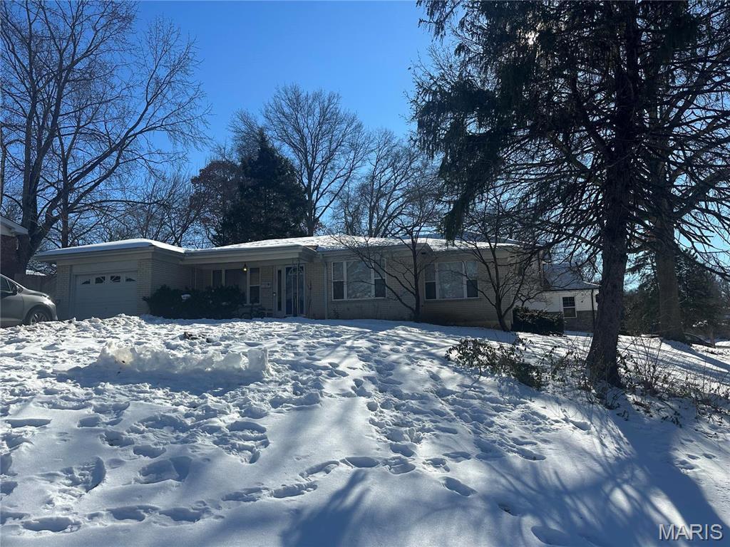 9908 Gilbrook Ave, Saint Louis, MO 63119 - ranch-style home featuring an attached garage