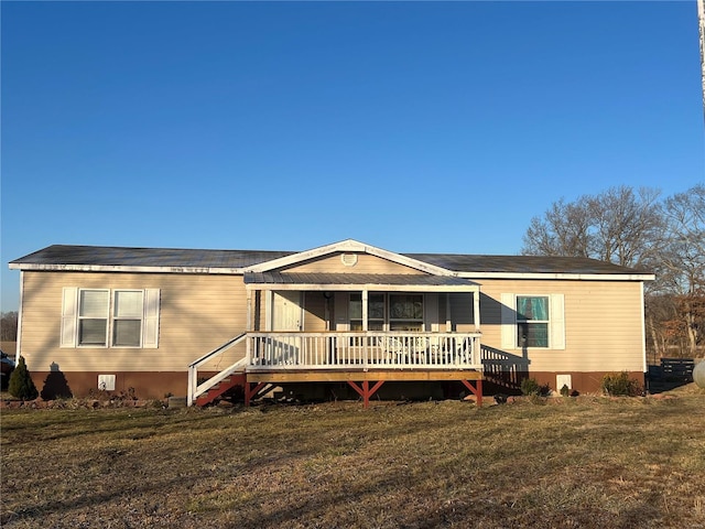 1539 Bcr 628, Puxico, MO 63960 - manufactured / mobile home featuring a front yard and a wooden deck