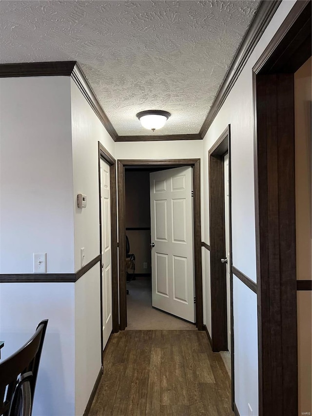 1539 Bcr 628, Puxico, MO 63960 - hall featuring crown molding, dark wood finished floors, and a textured ceiling