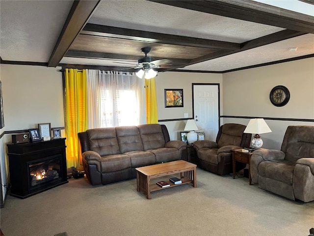 1539 Bcr 628, Puxico, MO 63960 - living room featuring carpet flooring, beamed ceiling, a ceiling fan, a glass covered fireplace, and a textured ceiling