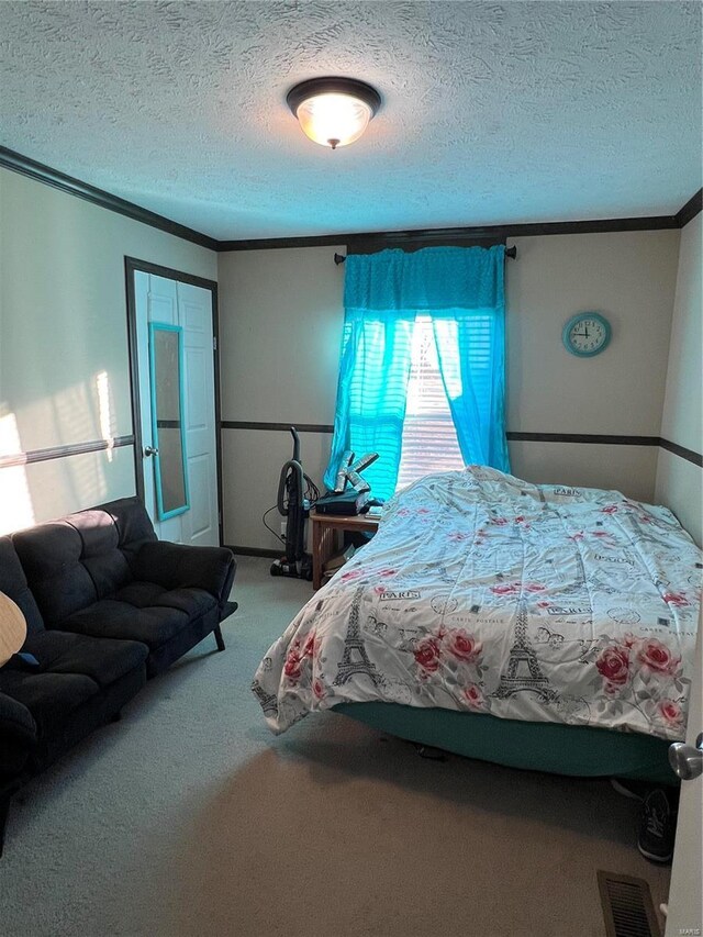 1539 Bcr 628, Puxico, MO 63960 - carpeted bedroom featuring ornamental molding and a textured ceiling