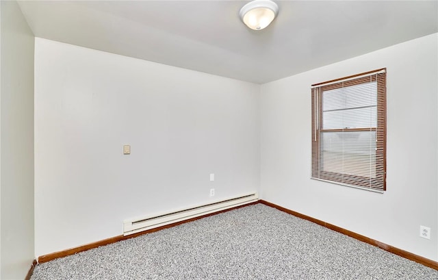1991 State Highway H, Sikeston, MO 63780 - carpeted spare room with a baseboard radiator and baseboards