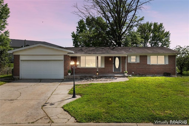 37 Cloverdale Dr, Saint Charles, MO 63304 - single story home featuring concrete driveway, an attached garage, brick siding, and a front lawn
