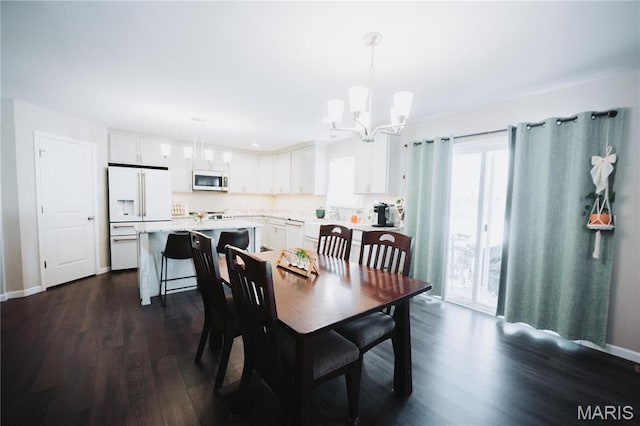 104 Eisenhower Blvd, Troy, IL 62294 - dining space with a chandelier, dark wood-type flooring, and baseboards