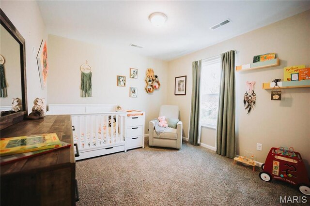 104 Eisenhower Blvd, Troy, IL 62294 - bedroom with a nursery area and carpet