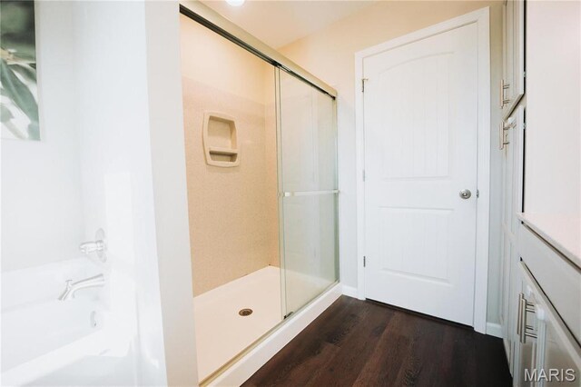 104 Eisenhower Blvd, Troy, IL 62294 - full bathroom with a stall shower, wood finished floors, and vanity