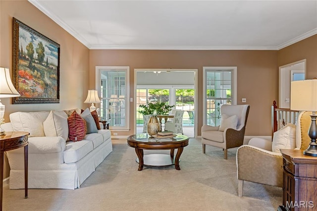 living area with light carpet and crown molding