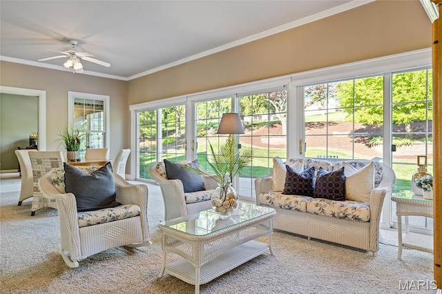 sunroom featuring carpet floors and crown molding