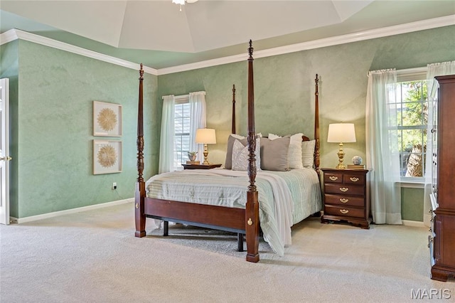 carpeted bedroom with baseboards and crown molding