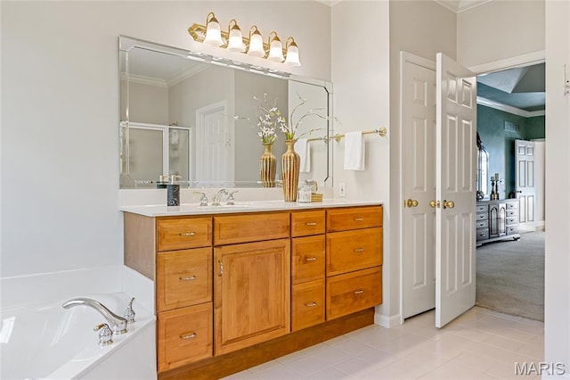 full bathroom with ornamental molding, a stall shower, vanity, tile patterned flooring, and a garden tub