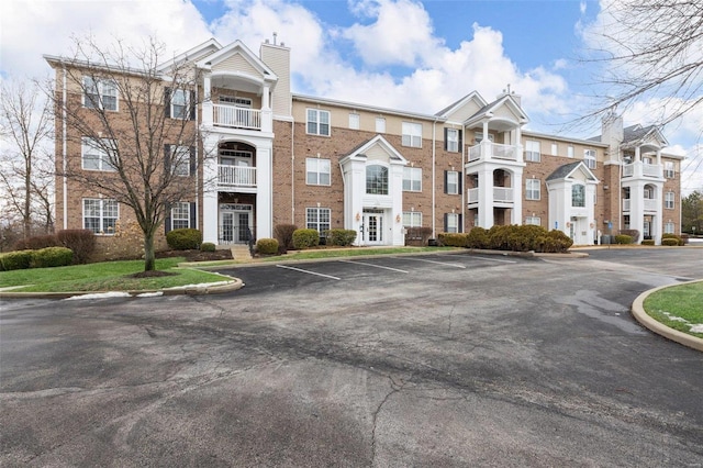 1163 Mill Crossing Dr Unit 205, Creve Coeur, MO 63141 - view of building exterior with uncovered parking