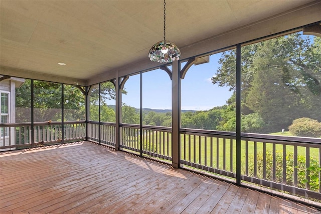 unfurnished sunroom with plenty of natural light