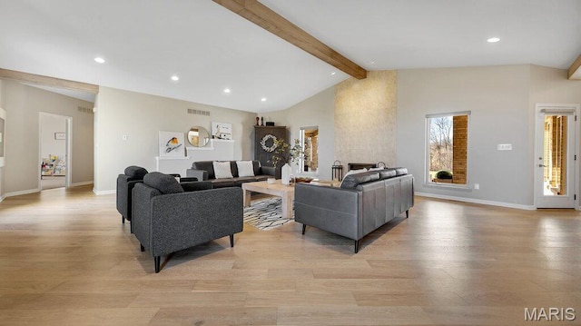 living area with light wood-style floors, recessed lighting, and baseboards