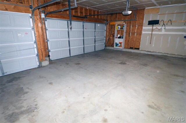 936 Palamino Path, High Ridge, MO 63049 - garage featuring a garage door opener