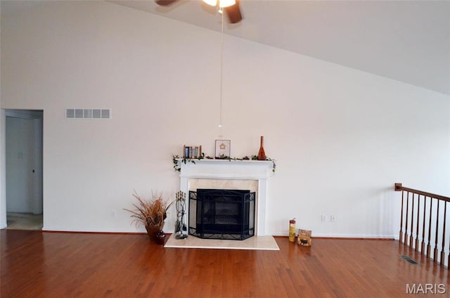 936 Palamino Path, High Ridge, MO 63049 - unfurnished living room with a ceiling fan, a premium fireplace, wood finished floors, and baseboards