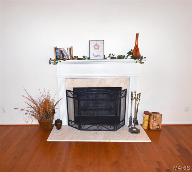 936 Palamino Path, High Ridge, MO 63049 - detailed view of a premium fireplace, wood finished floors, and baseboards