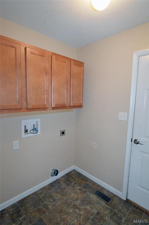 936 Palamino Path, High Ridge, MO 63049 - washroom with cabinet space, hookup for a washing machine, baseboards, stone finish flooring, and electric dryer hookup