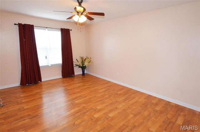 936 Palamino Path, High Ridge, MO 63049 - unfurnished room with light wood-style flooring, ceiling fan, and baseboards